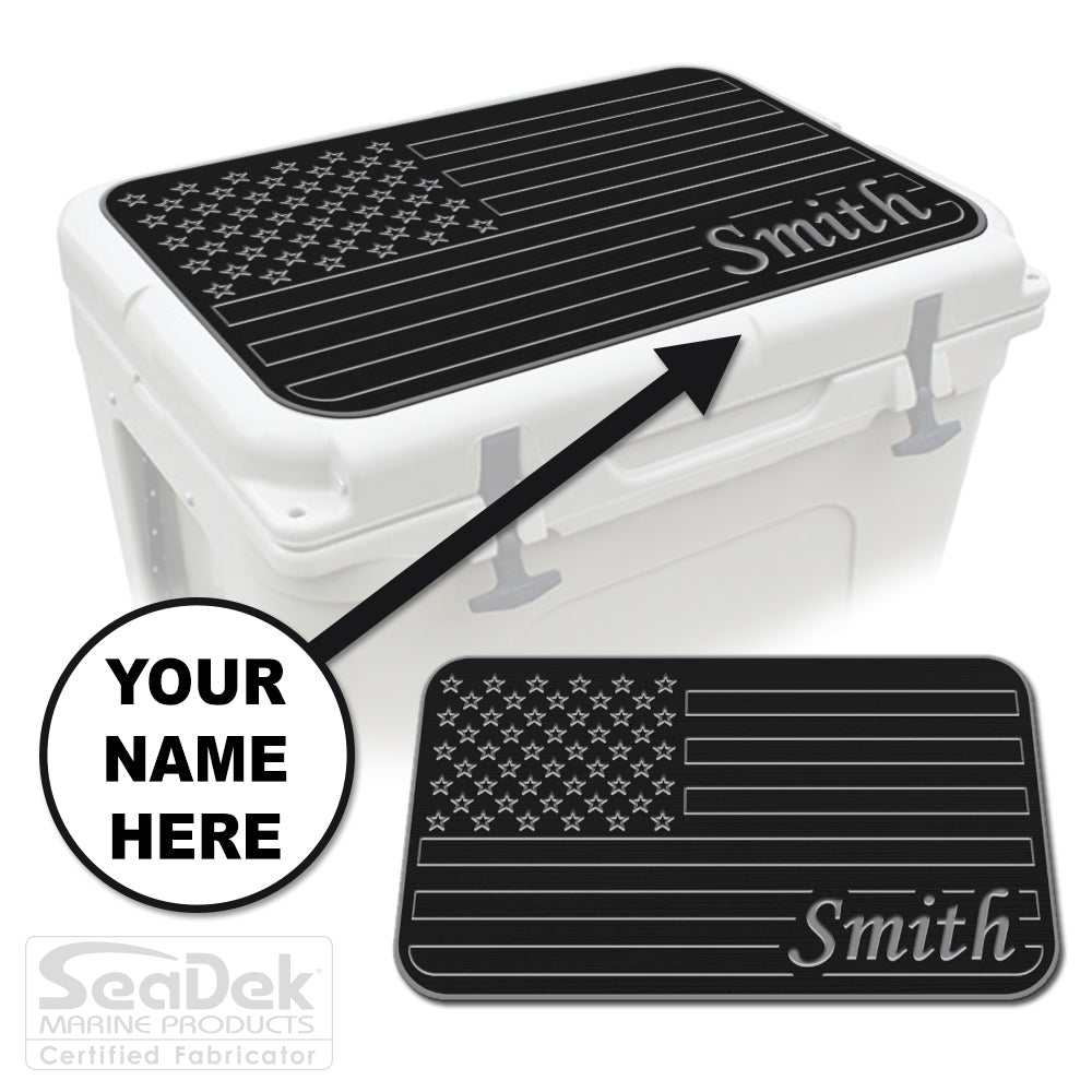 Custom SeaDek cooler pad top in Black/StormGray U.S. Flag design with personalized name engraving, made to fit YETI and RTIC coolers premium EVA foam pad by USATuff.