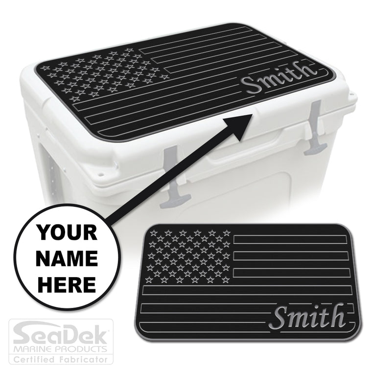 Custom SeaDek cooler pad top in Black/StormGray U.S. Flag design with personalized name engraving, made to fit YETI and RTIC coolers premium EVA foam pad by USATuff.